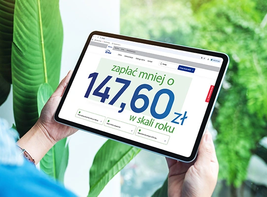 Tablet z informacją "zapłać mniej"